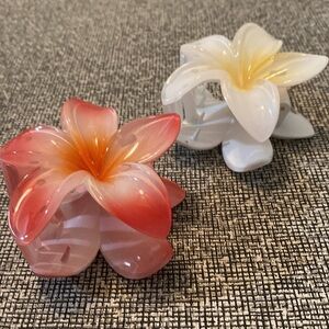 Hawaiian flower hair claw clips. New with box.